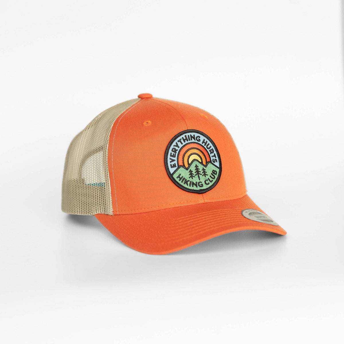 Bright orange Everything Hurts Hiking Club trucker hat paired with khaki mesh side panels.