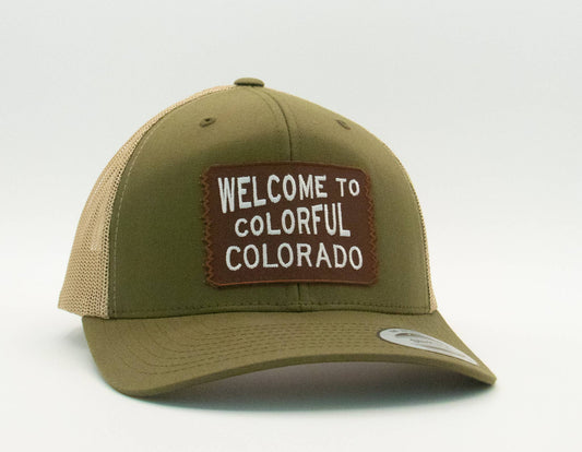 Olive green Welcome to Colorful Colorado trucker hat with khaki mesh sides and a brown embroidered patch.