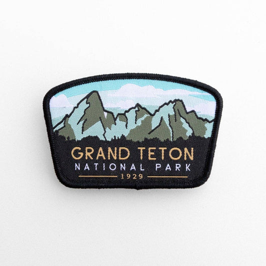 Flat on white, the Grand Teton National Park patch shows its stitched peaks, pale sky and 1929 date line.