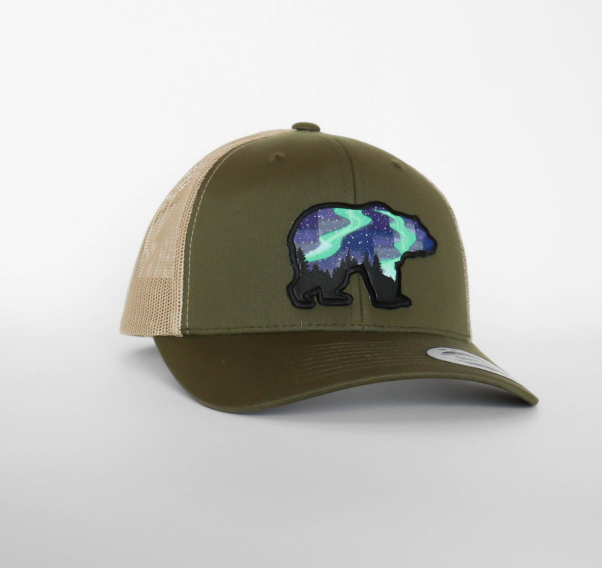 Olive green crown and tan mesh carry the Northern Lights Grizzly Bear patch above a matching curved brim.