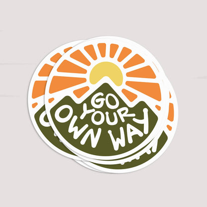 Two Go Your Own Way stickers stacked and fanned apart on a plain light surface.