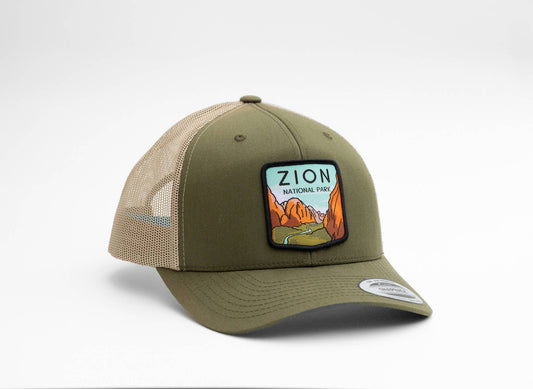 Olive and khaki Zion National Park trucker hat angled to show the canyon patch on its front panel.