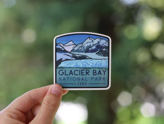 Held farther back in soft daylight, the Glacier Bay National Park sticker shows its 1980 date below the lettering.