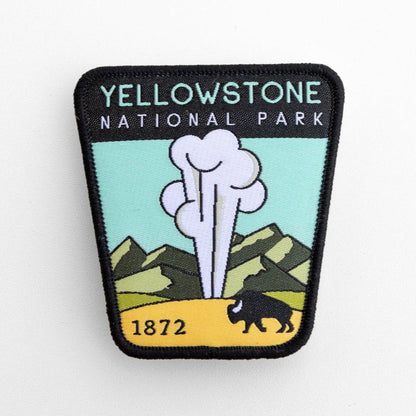 Straight on and slightly larger in frame, the Yellowstone National Park patch reads 1872 along its base.