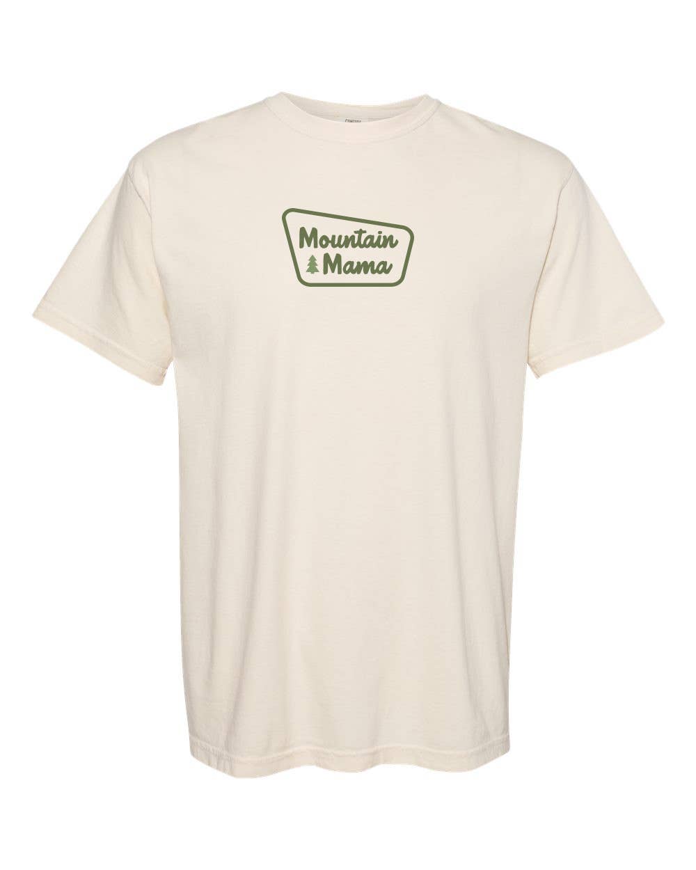 The ivory Mountain Mama T shirt lies flat on white, green badge logo centered on the chest.
