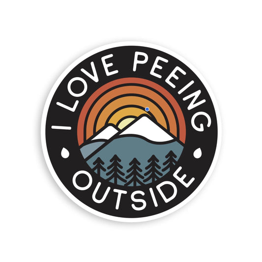 Round I Love Peeing Outside sticker on white, with a sunset arc, snowy peaks and pine trees inside black.
