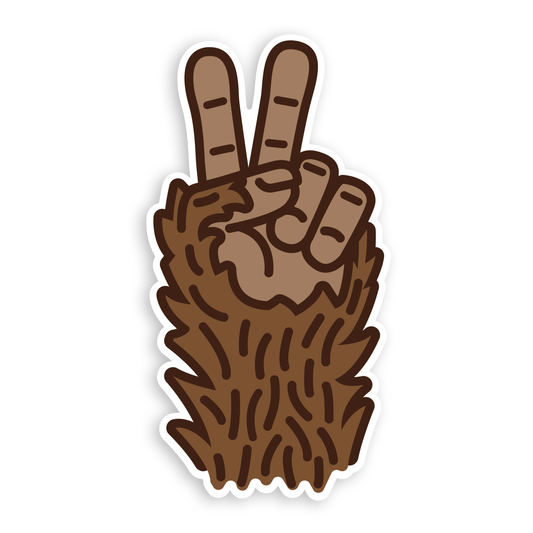 On a plain white background, the Bigfoot Peace sticker shows a furry brown hand making a peace sign.