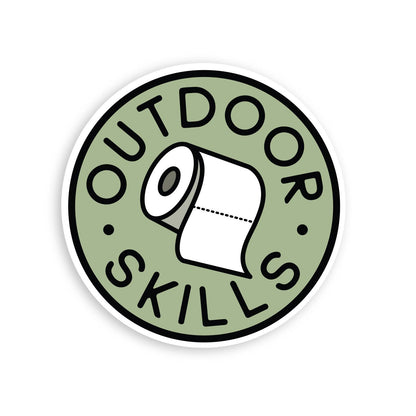 Round green Outdoor Skills sticker with a toilet paper roll and black lettering on a white background.
