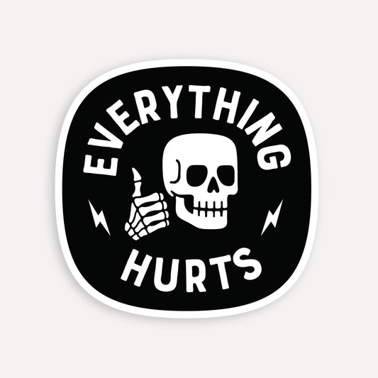 Black and white Everything Hurts sticker with a thumbs up skeleton and lightning bolts on a plain background.