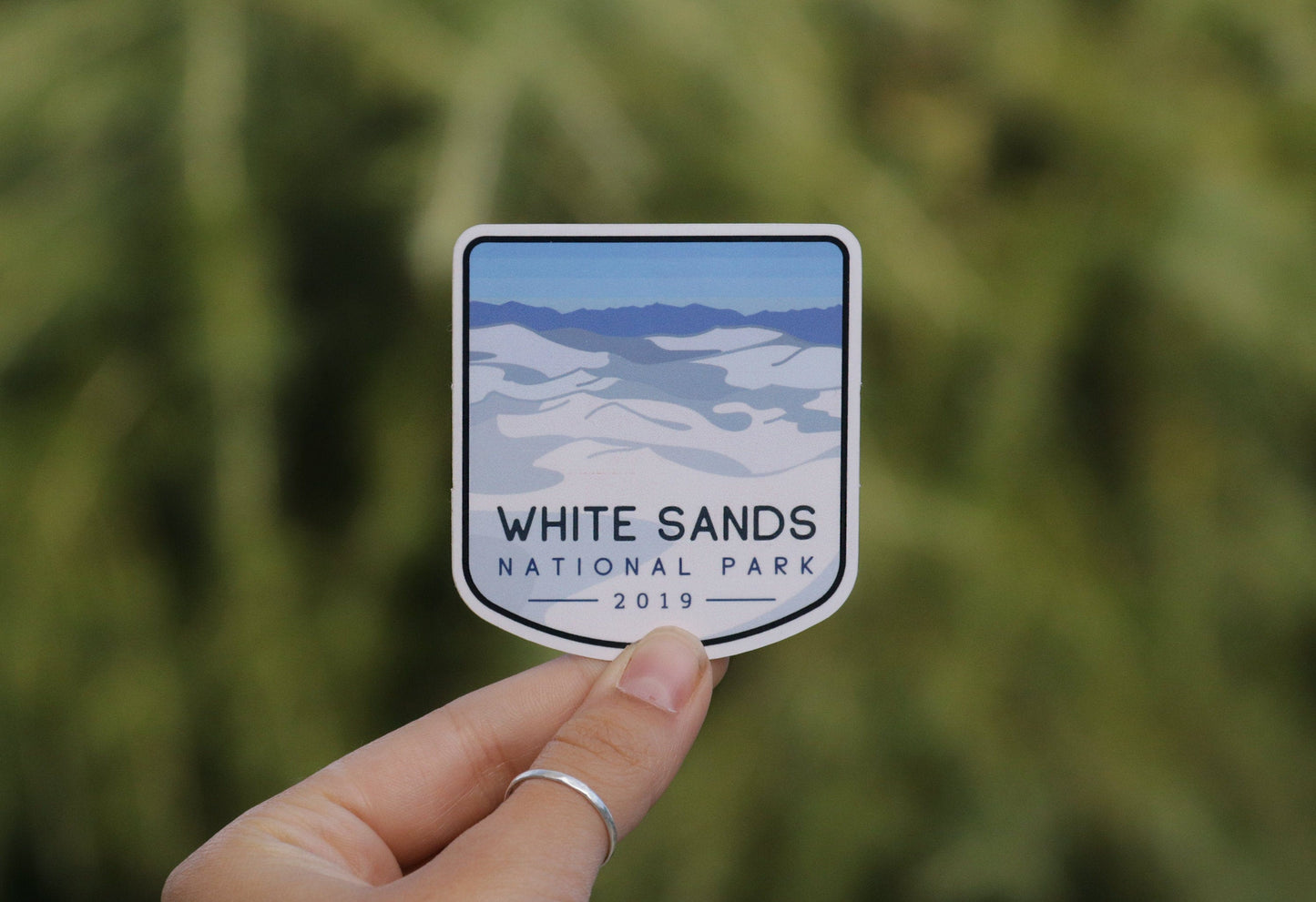 Pulled back a little, the White Sands National Park sticker shows its dunes and 2019 date over soft greenery.