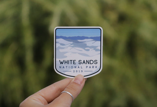 Pulled back a little, the White Sands National Park sticker shows its dunes and 2019 date over soft greenery.