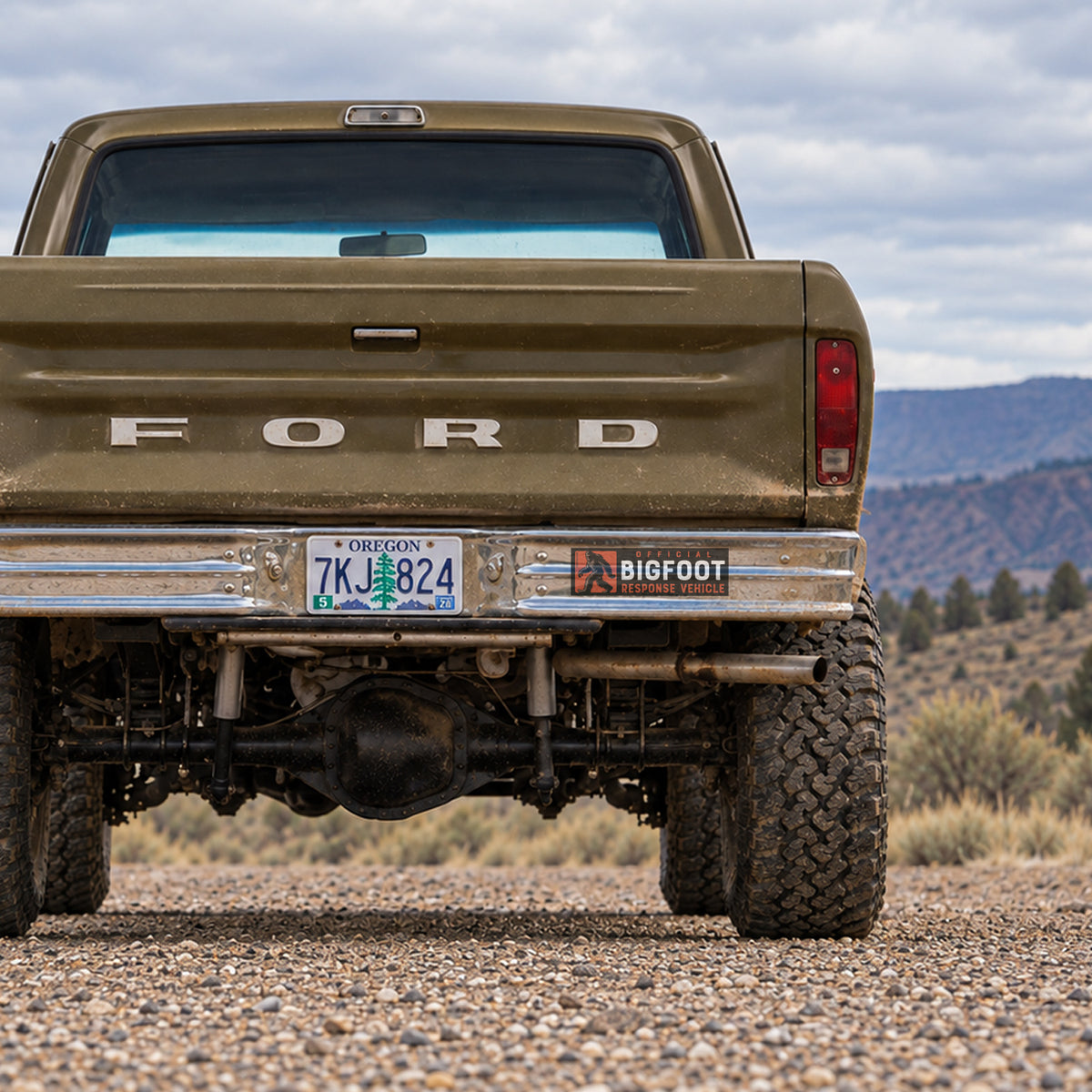 A smaller strip version of the Bigfoot Response Vehicle sticker rides the rear bumper of an Oregon pickup truck.
