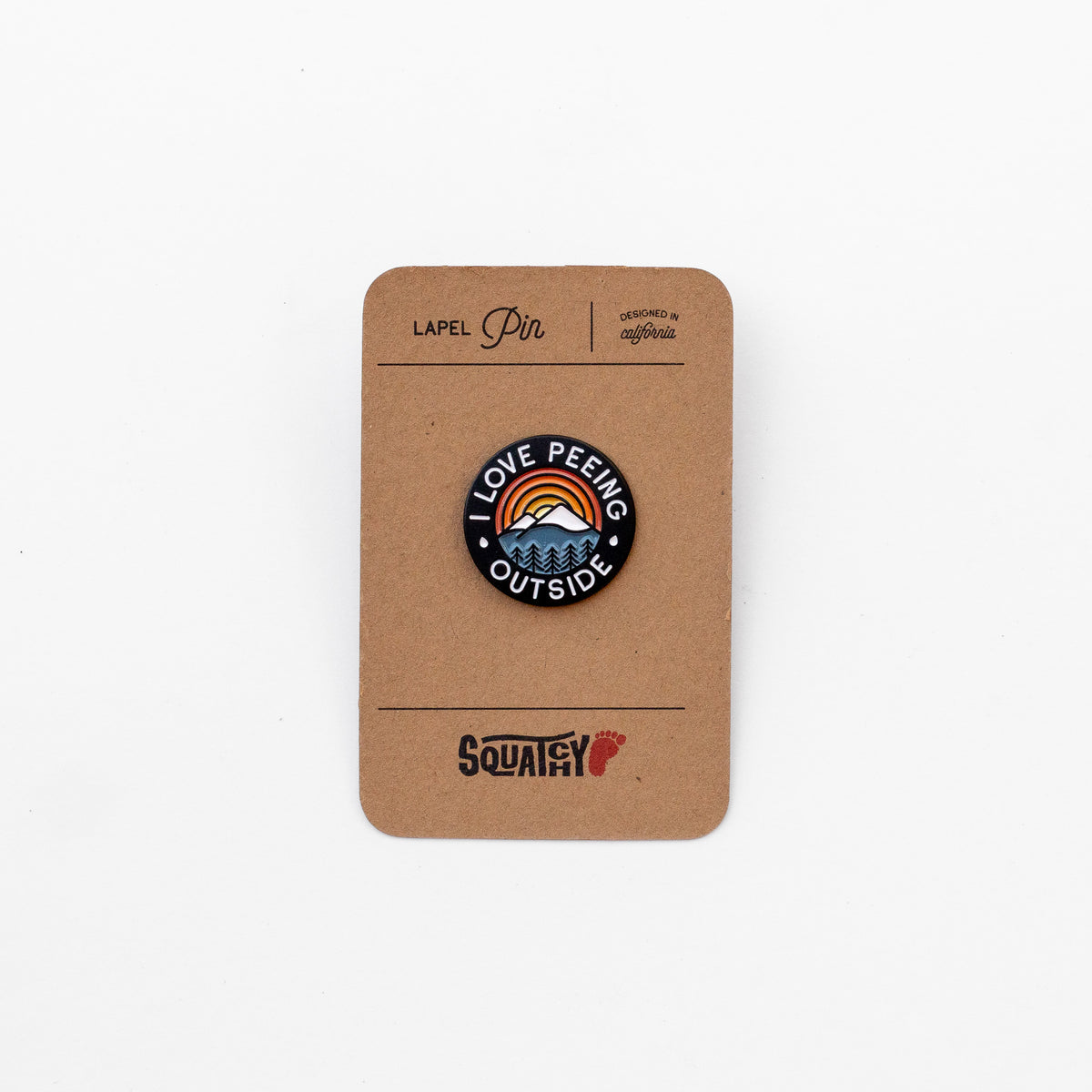 On its kraft Squatchy backing card, the I Love Peeing Outside pin shows a mountain and sunrise design in enamel.