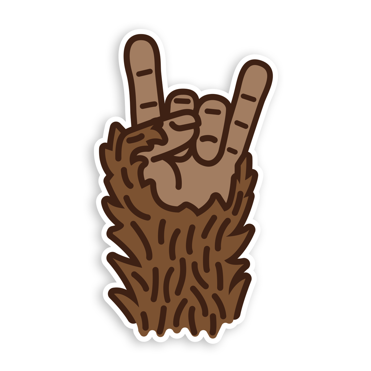 The Bigfoot Rocks sticker on plain white, a furry brown hand throwing devil horns with a white cut edge.